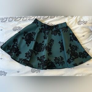 Wet Seal Skirt. Green with black details. Size S